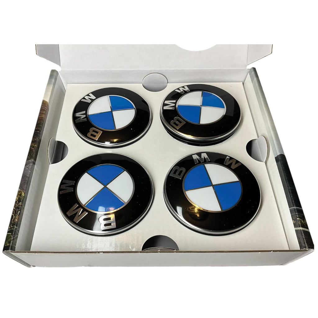 Open box with 4 BMW floating wheelcaps inside