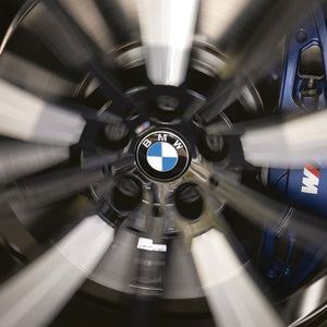 Alloy wheel spinning with BMW floating centre cap fitted