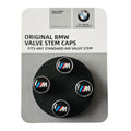BMW valve stem caps on packaging with BMW logo