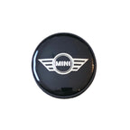 Single mini wing logo wheel centre cap on a white background
