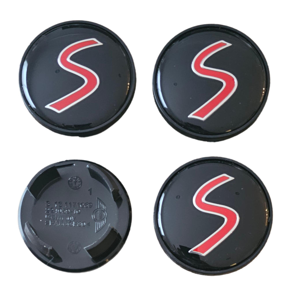 Four MINI cooper 54mm red 'S' logo wheelcaps on a white background