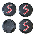 Four MINI cooper 54mm red 'S' logo wheelcaps on a white background