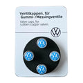 VW Volkswagen tyre valve caps on a branded card with text in German.