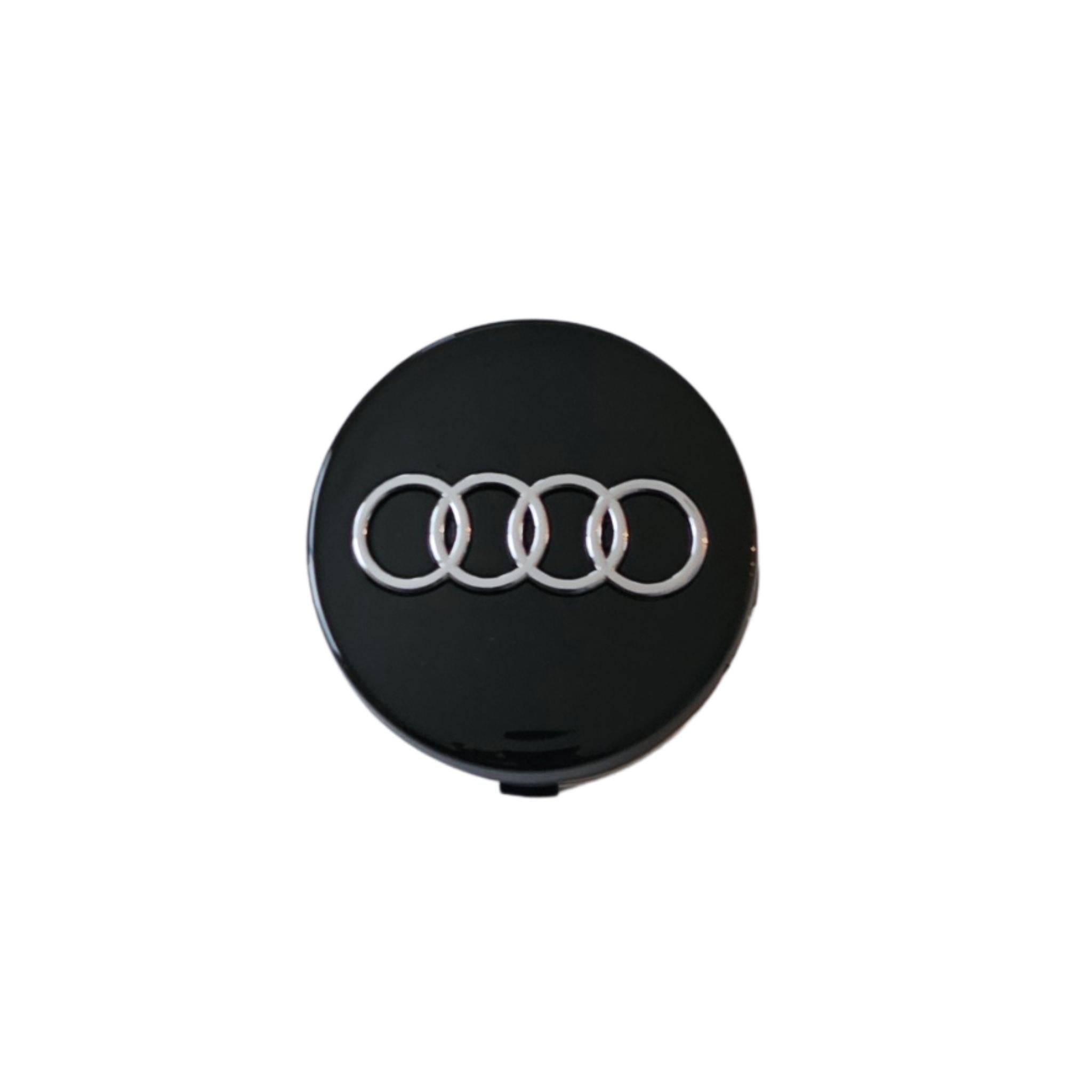Single Audi 60mm wheel centre cap with rings logo on a white background