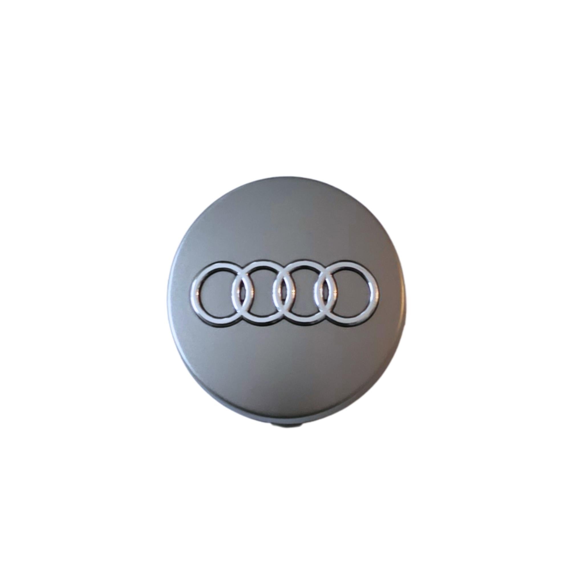 Audi 60mm Silver Grey wheel centre cap with rings logo on a white background