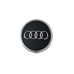 Audi 61mm black logo wheel centre cap on a white background