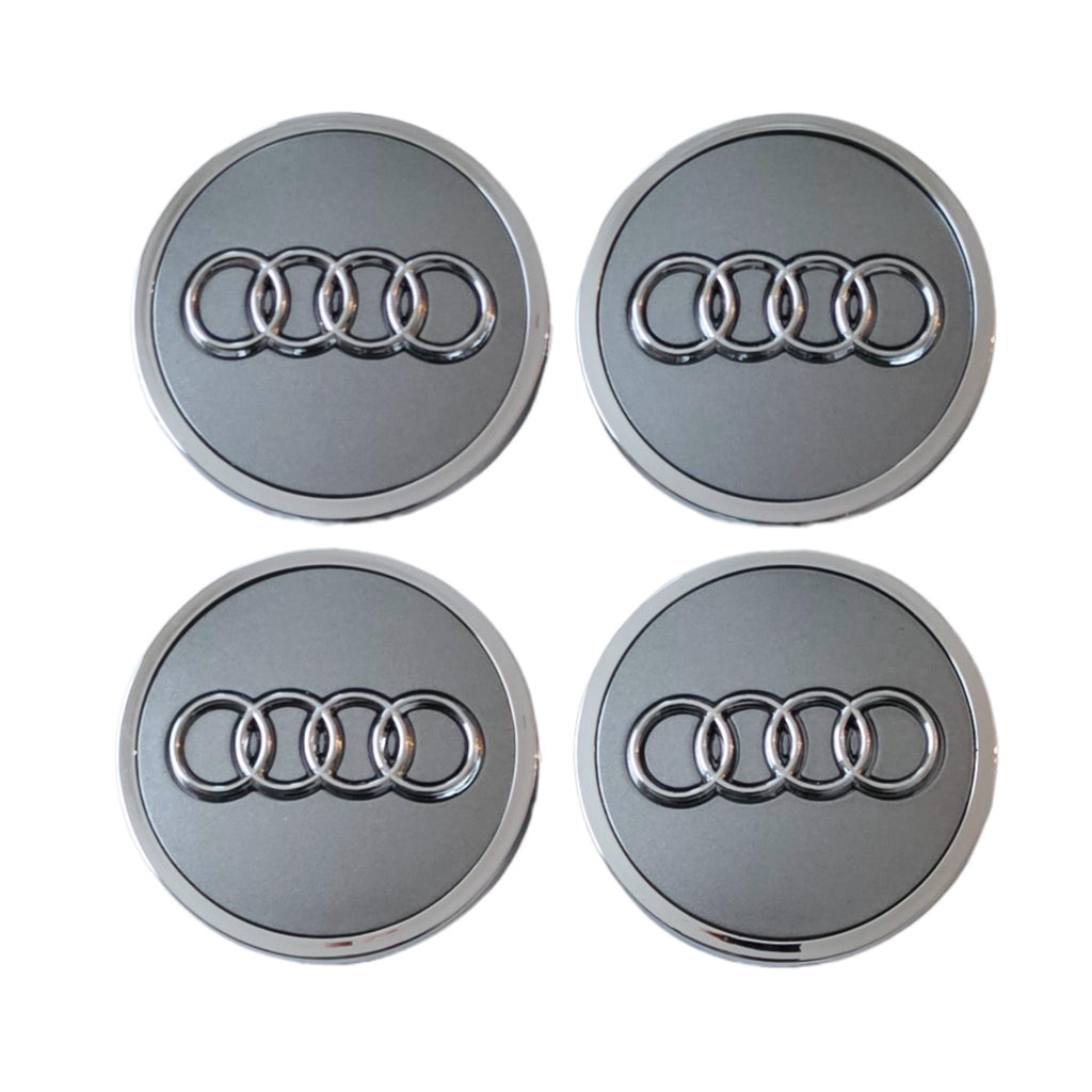 Four 61mm Silver Grey Audi Wheelcaps on a white background
