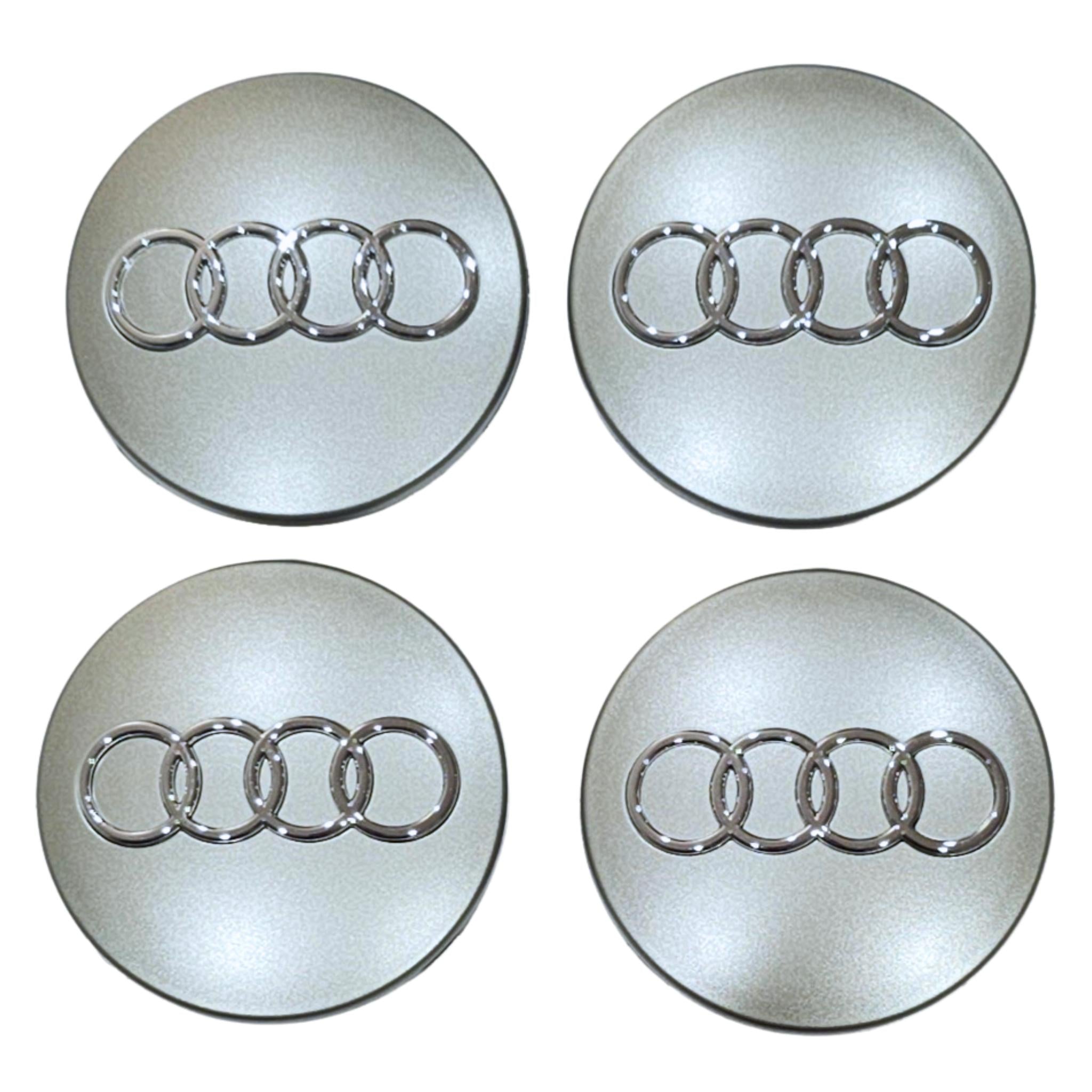 Four Audi 68mm Silver wheel centre caps on a white background