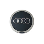 Single 69mm Black Audi wheel center cap on a white background