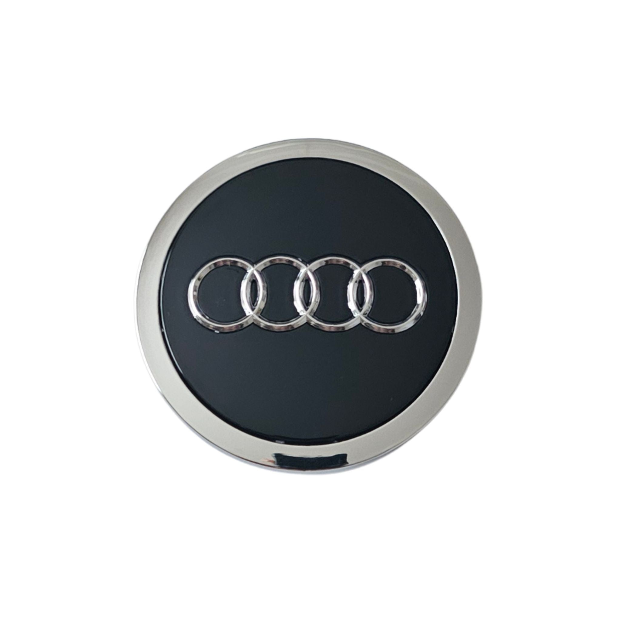Single 69mm Black Audi wheel center cap on a white background