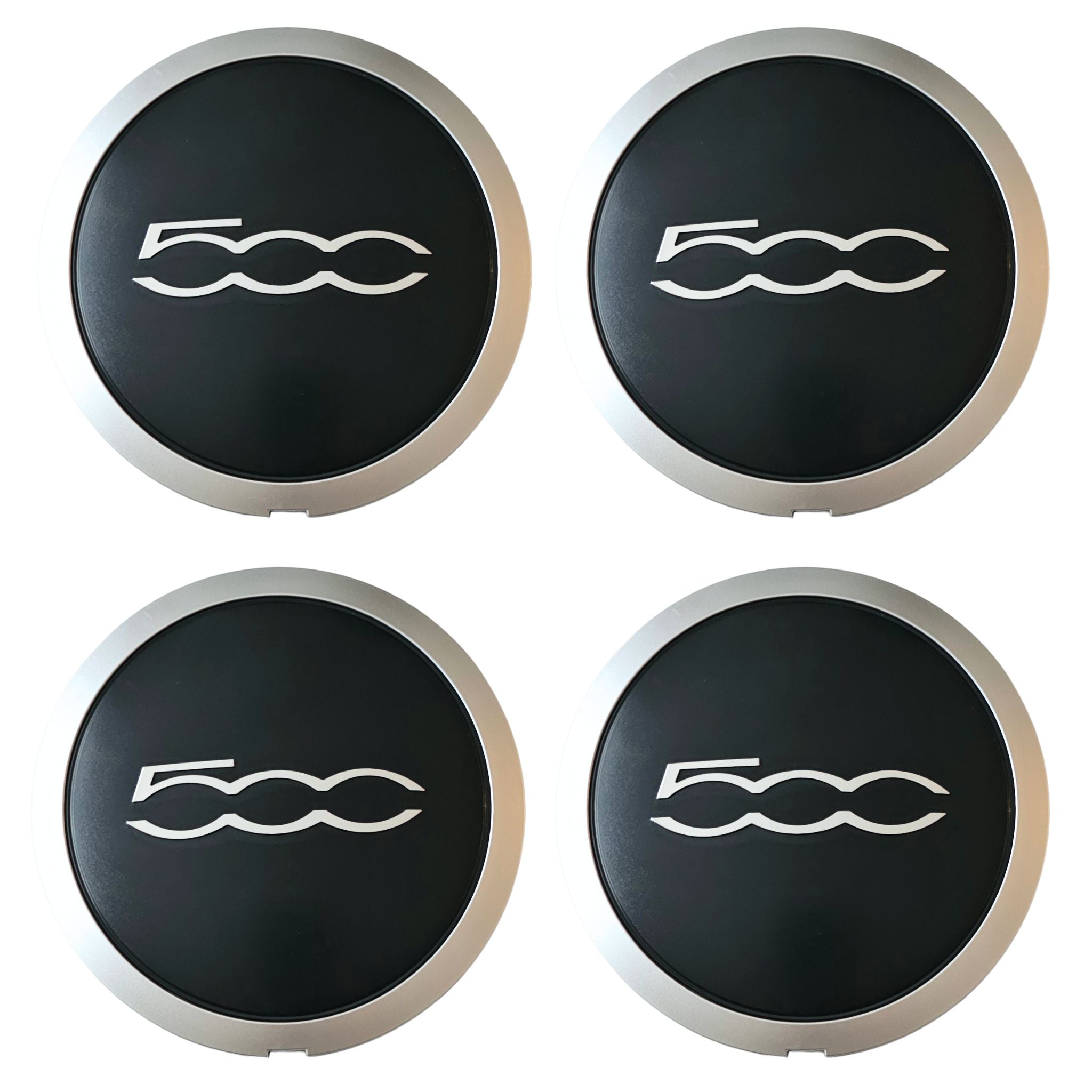 Four Fiat 500 Wheel Centre Caps 133mm 68078419AC on a white background