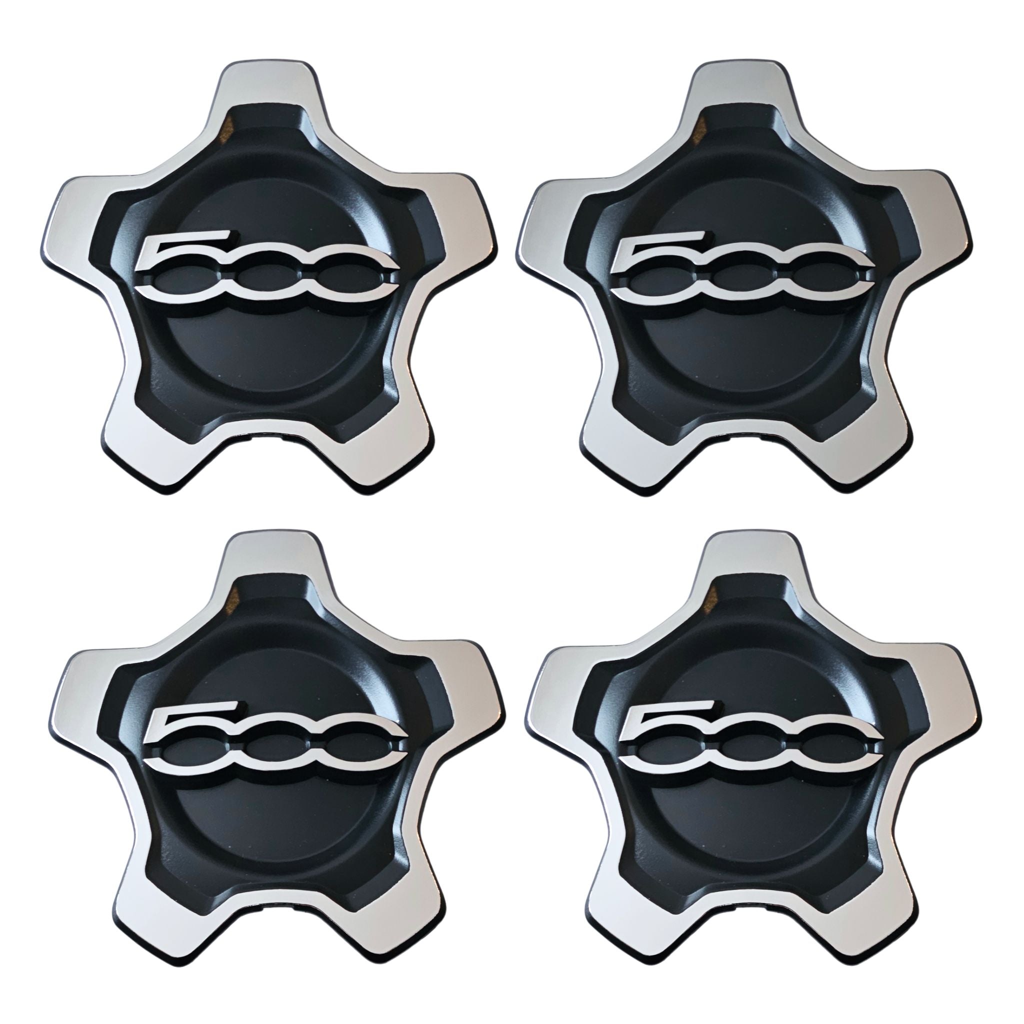 Four Fiat 500X Wheel Centre Caps 735626312 Black Silver on a white background