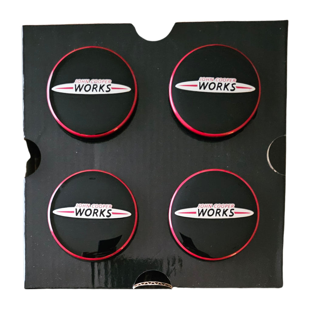 MINI JCW Spinning Floating Wheel Centre Caps Set of 4 out of box on a white background