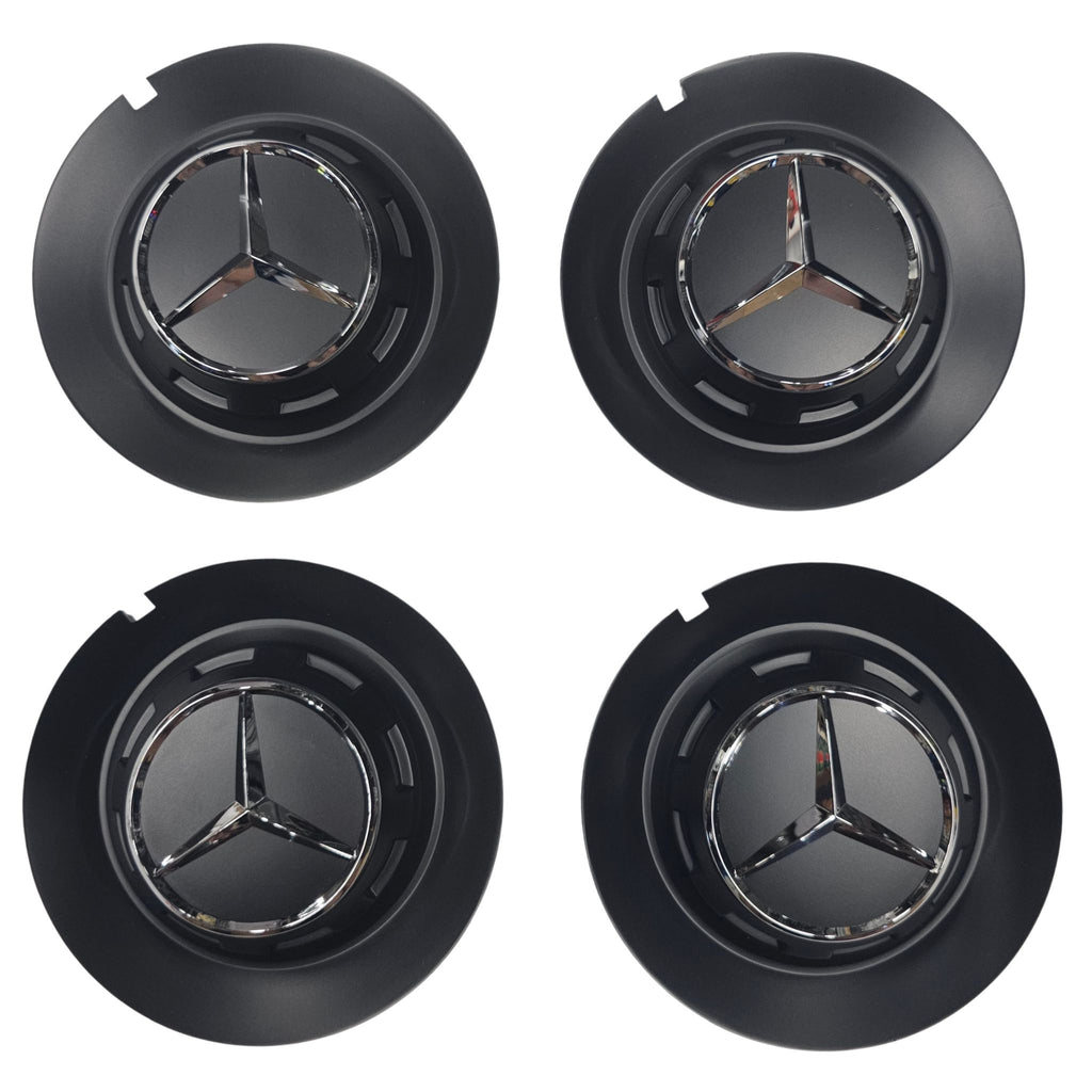 Four black Mercedes 147mm wheel center caps with emblem on a white background