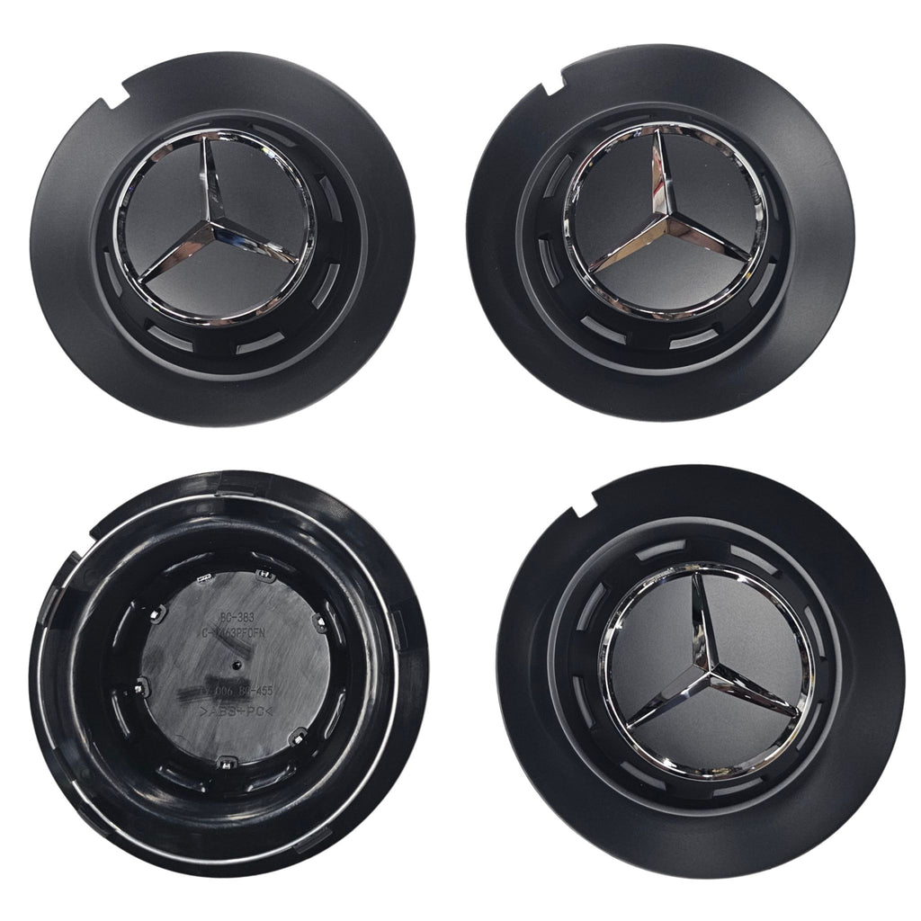 Four black Mercedes 147mm  wheel center caps one showing rear side on a white background