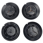 Four black Mercedes 147mm  wheel center caps one showing rear side on a white background
