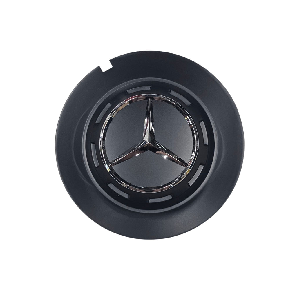 Single Black Mercedes 147mm wheel centre cap with emblem on a white background
