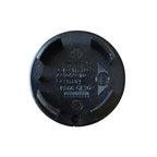 Rear of MINI 54mm Text Logo Wheel Centre Cap on a white background