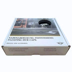 White cardboard packaging box for Mini dynamic floating 56mm wheel centre caps on a white background