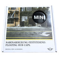 MINI Dynamic Floating Centre Caps with Spinning Mechanism in white product box on a white backgound