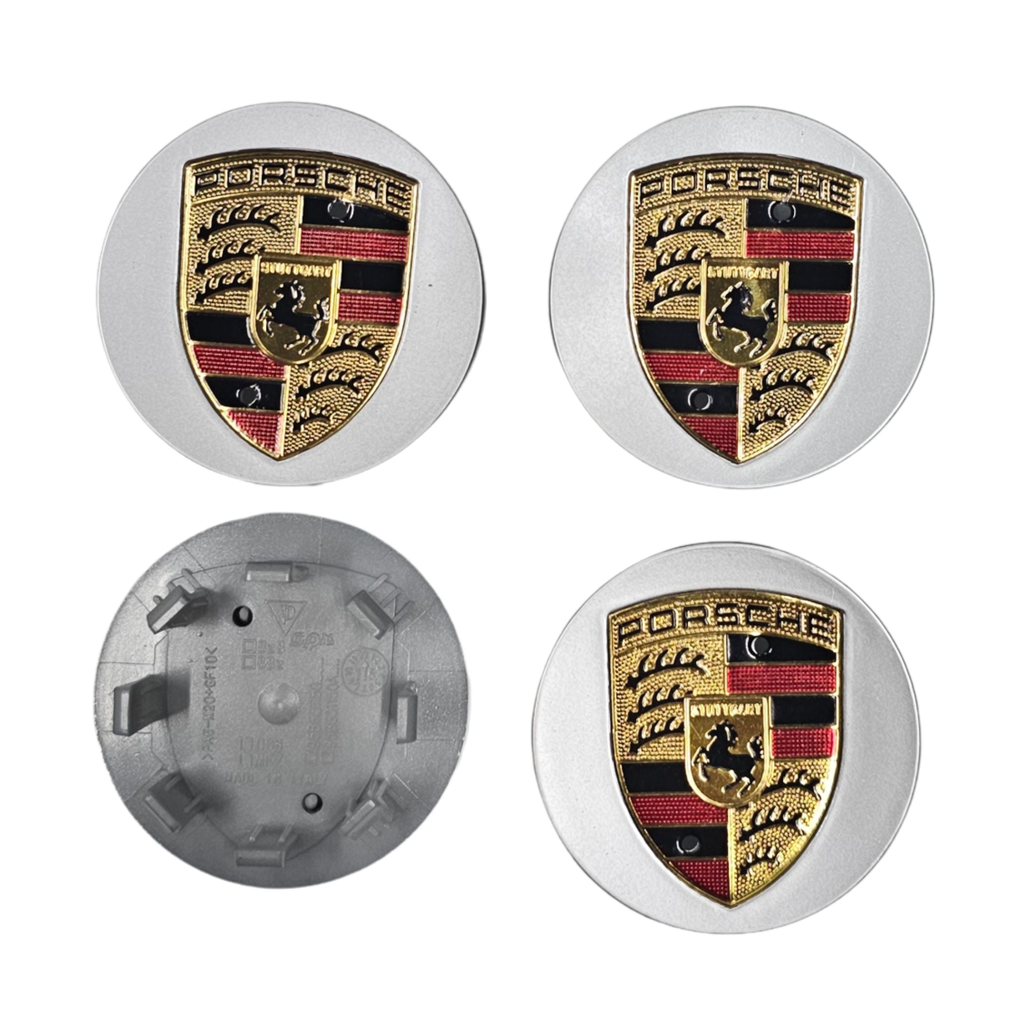 Four Porsche wheel hub caps with the brand logo emblem on a white background