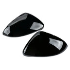 Pair of Gloss Black Mirror Covers for VW Golf Mk7 Mk7.5 on a white background