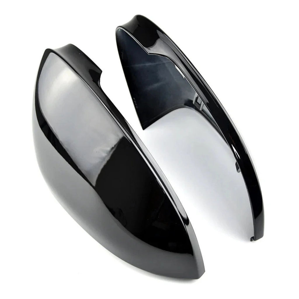 Side view of Gloss Black Mirror Covers for VW Golf Mk8 & Mk8.5 GTI R TSI TDI on a white background