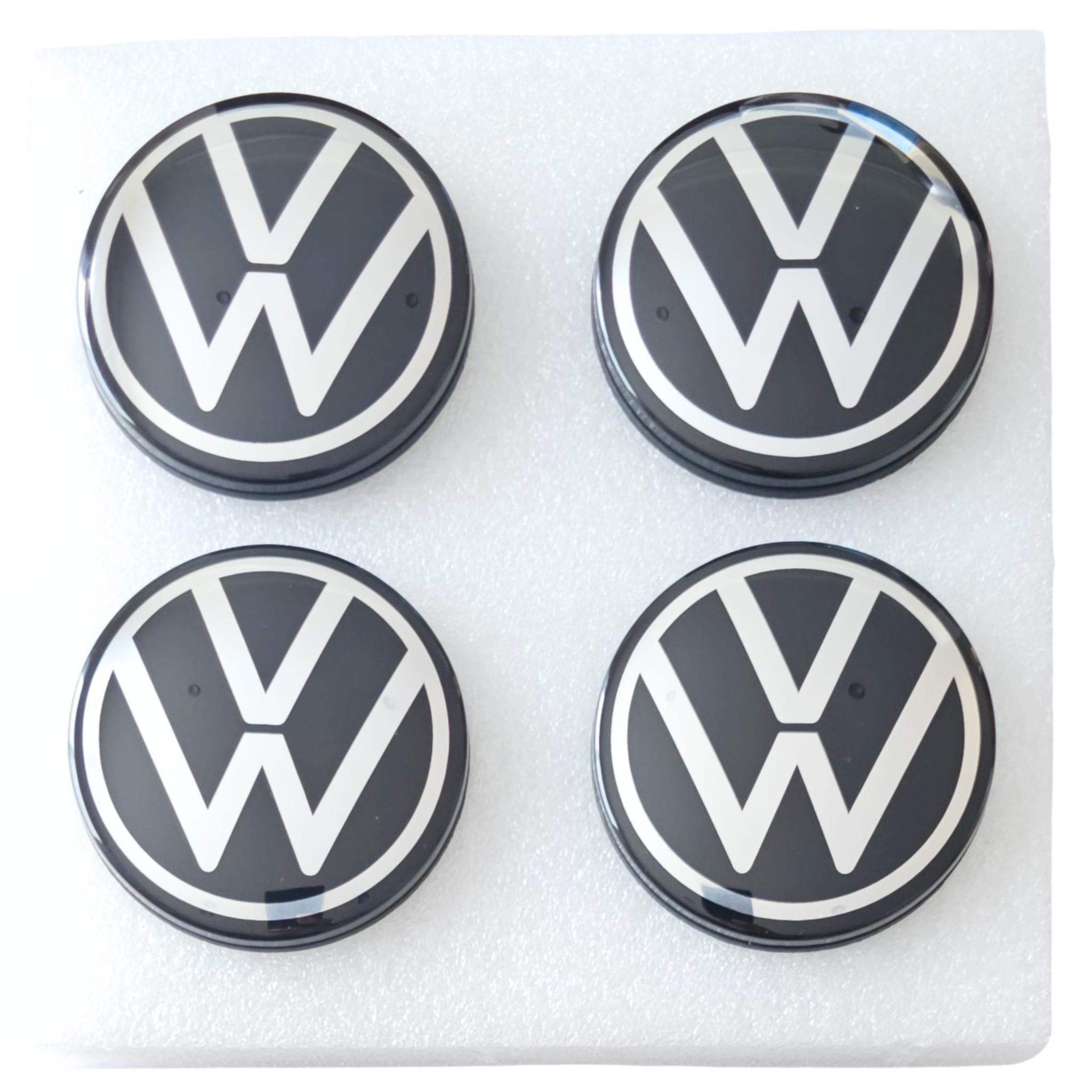 VW dynamic self levelling wheel centre caps 65mm set of 4 in foam packaging
