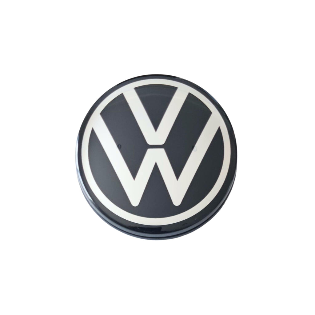 Single VW dynamic self levelling wheel centre cap 65mm on white background